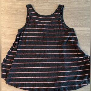 Free people swing tank, oversized. Lower cut in the back